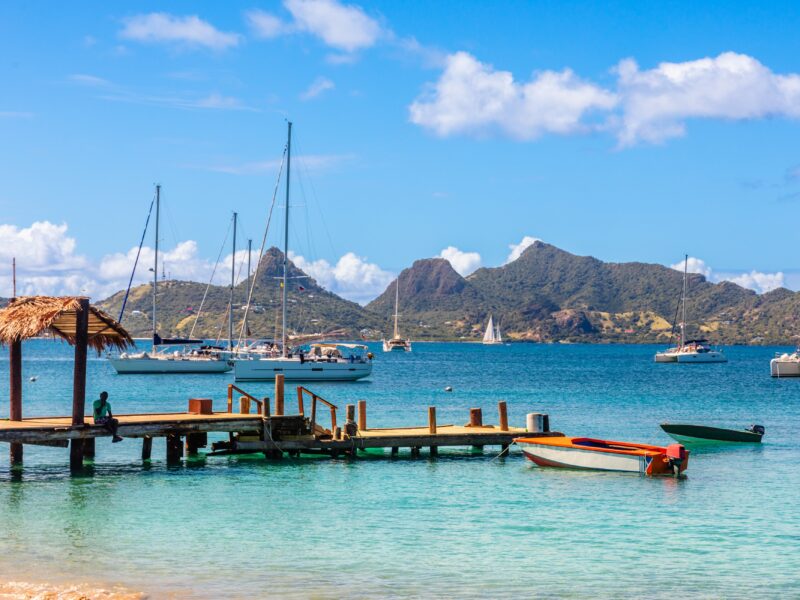 Lagoon,With,Turquoise,Waters,,Yachts,And,Boats,At,Mayreau,Island
