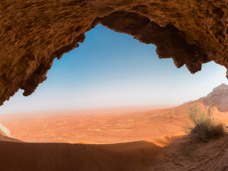Exploring,A,Cave,In,Sharjah,Desert